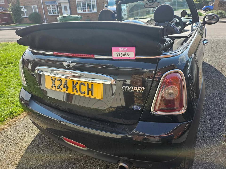 Mable the MINI wearing a pink personalised boot tag