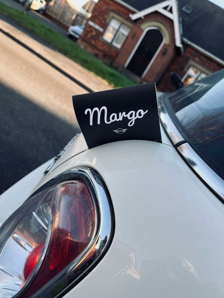 Margo the MINI wearing a black personalised boot tag